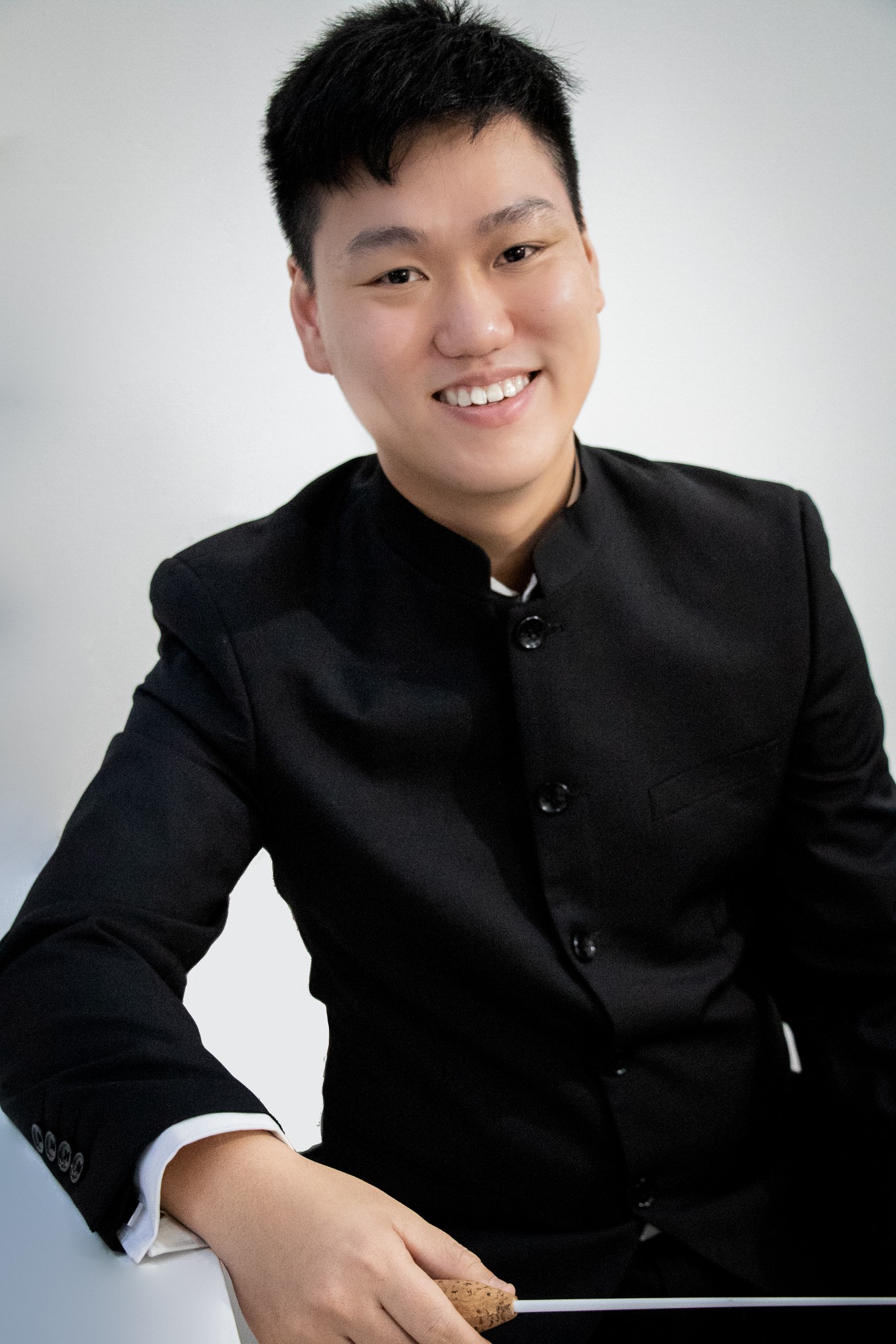 Headshot of conductor Melvin Tay